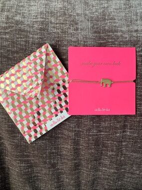 Stella & Dot Gold Elephant Bracelet on Hot Pink Card with Patterned Envelope